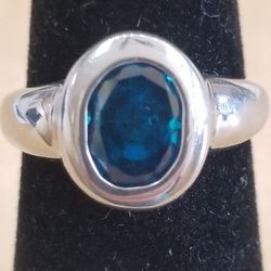 Ring With Bezel Set Blue Stone