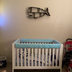 Nautical/whale themed nursery room decor