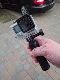 GoPro Hero 4 Action Camera with Waterproof Case and Handle