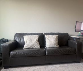 Ashley Furniture Genuine Gray  Sofa and Love Seat Set