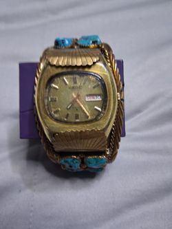 Vintage Gold-Tone Watch with Turquoise Stone Band
