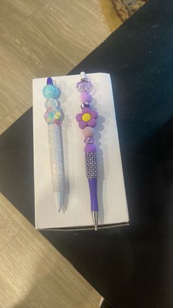 Rhinestone picker and a pen