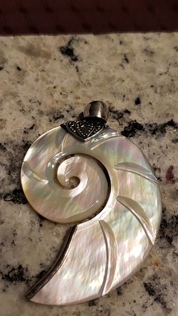 Mother of Pearl shell pendant with sterling silver bail