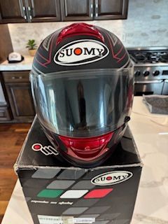 Two Suomy Motorcycle Helmets