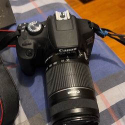 1500D Cannon camera With Charger 