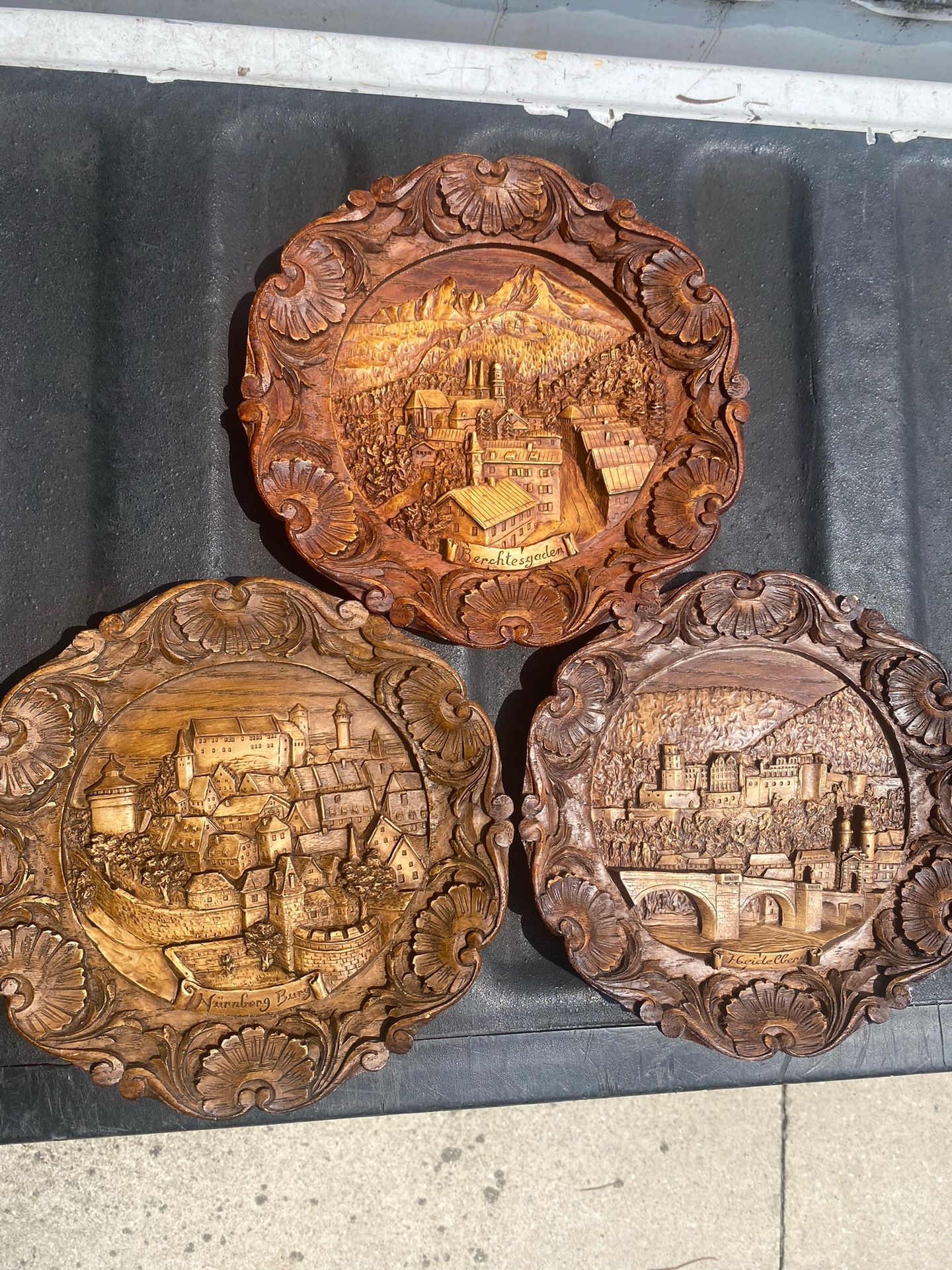 Three 9” Vintage Faux Carved Wood Pressed Plaques: “Bertchesgaden”, “Heidelberg” & “Nurnberg Burg” Germany/Austria