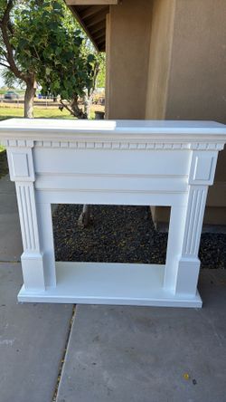 White freestanding fireplace mantle