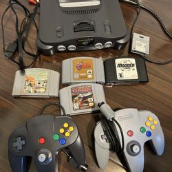 Nintendo 64 Console Gray with controller cords and 4 games