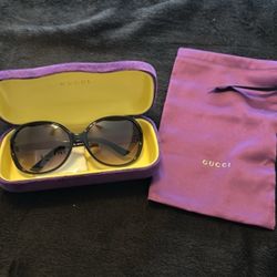 Gucci, Grady, and black and gold sunglasses