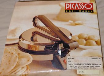 Brand new roti / chapti  maker machine in box ( never used ).