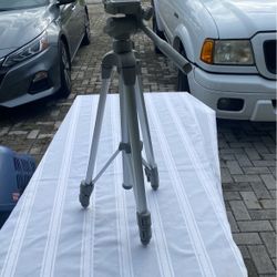Adjustable  Camera/ Video Tri Pod Excellant  Condition  Adjustable  To 4 1/2 Ft  
