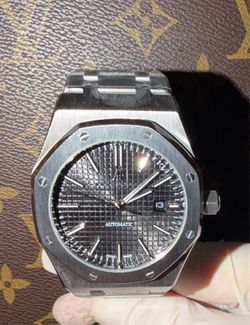 Black dial lux watch