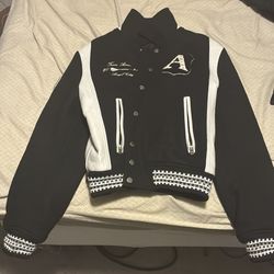 Black and white Amiri varsity jacket