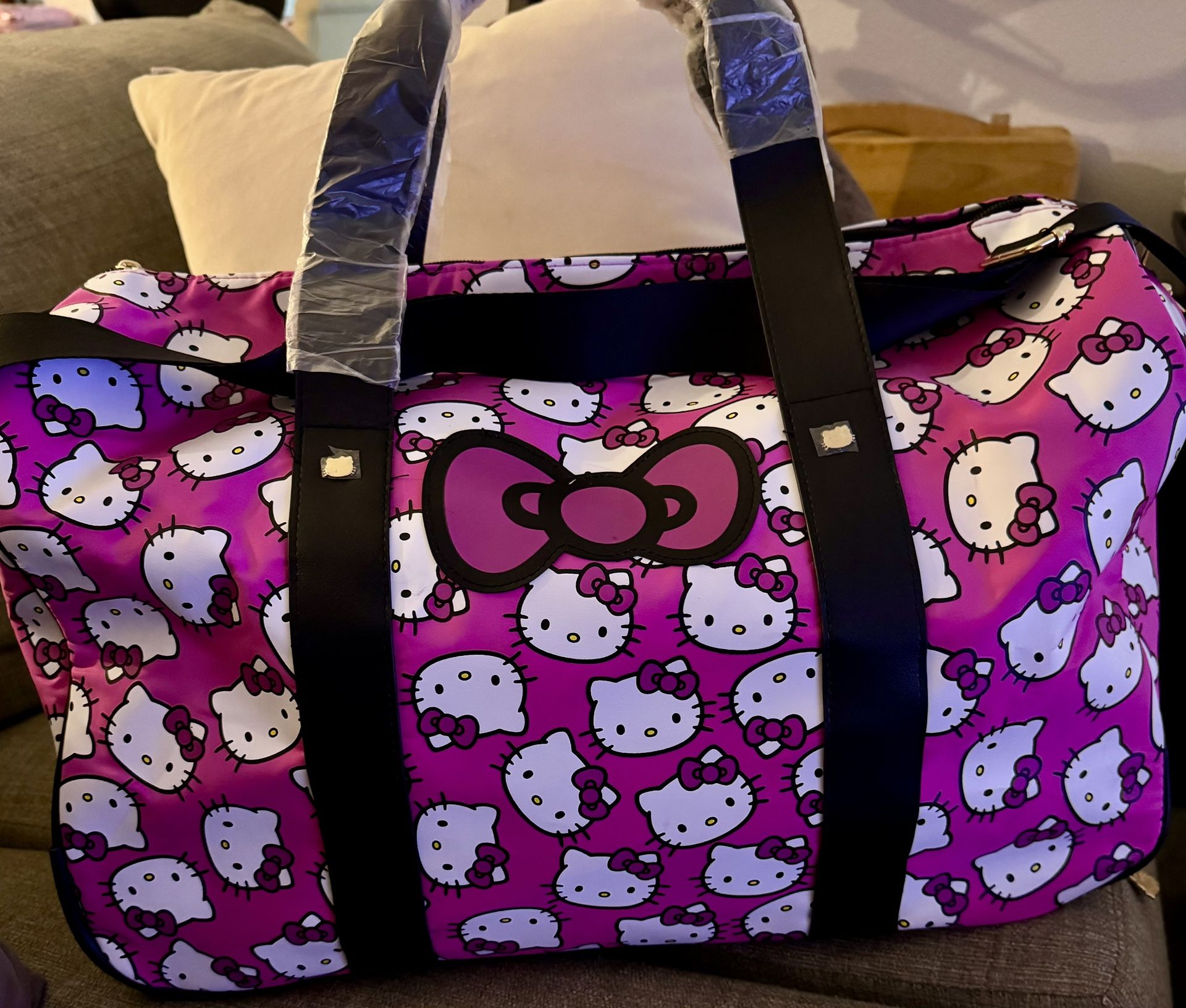 Brand New Hello Kitty Hot Pink Rolling Duffle Luggage Bag