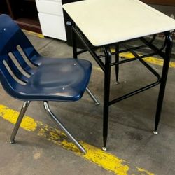 LOTS OF STUDENT DESKS WITH BLUE CHAIRS -can deliver-