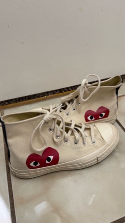 Comme des Garçons Play × Converse Chuck Taylor All Star High Top Sneakers with red heart graphics with eyes