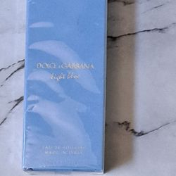 NEW & SEALED " AUTHENTIC DOLCE GABBANA LIGHT BLUE WOMAN'S PARFUM SPRAY 35$