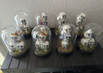 Custom Stacked Skulls With Moss In A Plastic Dome