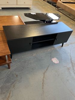Modern black tv stand (in store)