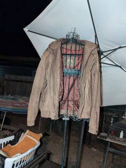 vintage Adventure Bound by Wilsons Leather jacket featuring a tan leather shell and stand collar design
