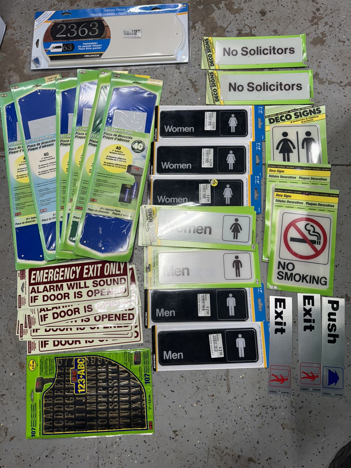 New Unopened Assorted Signage Lot. $15 Takes All. You Must Pickup