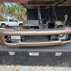 F250 FRT BUMPER CROME COVERED BY TAN WRAP
