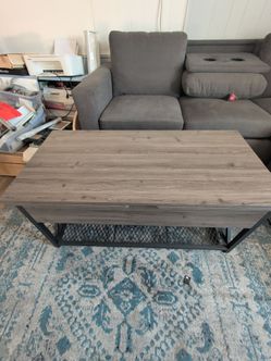 Coffee table - adjustable with storage and power connectors/outlets