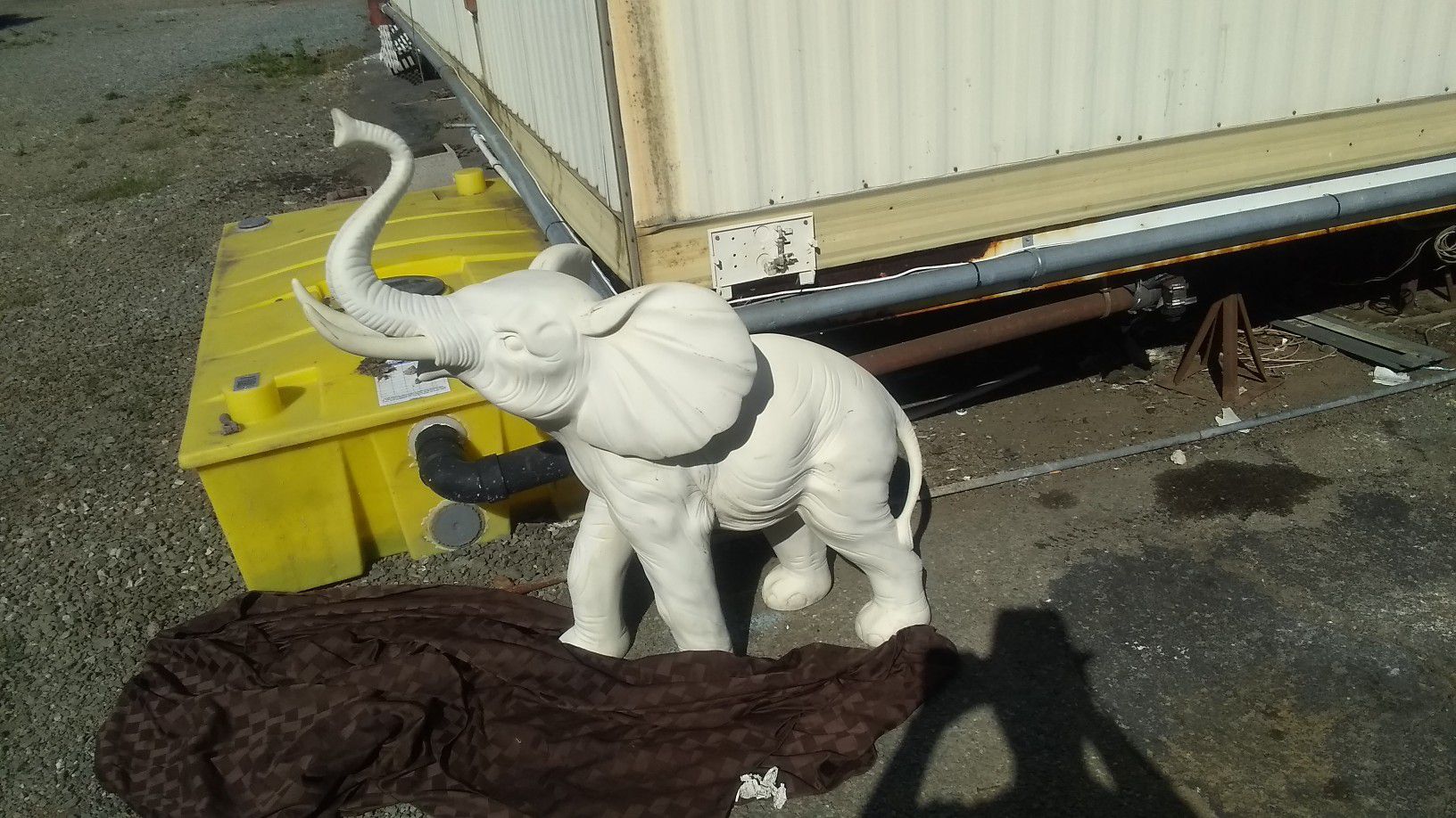 White white elephant 3 feet high 100 lb it's not made of plastic