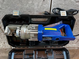 New electric rebar cutter model RC-16. Has 110V, 900W power, max punch diameter 16mm. Includes hard case, power cord, gloves, wrenches, and lubricant