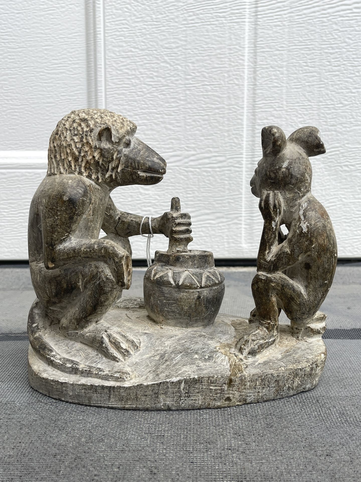 Antique"Whimsical Harmony: The Hare and hyena in a Mystical Stone Ritual"