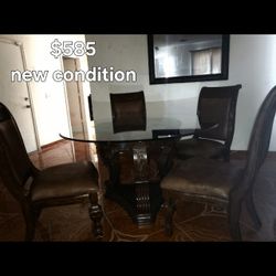 Dinning Room  Glass Top  With  Leather Chairs  .Solid  Wood. $575 Obo