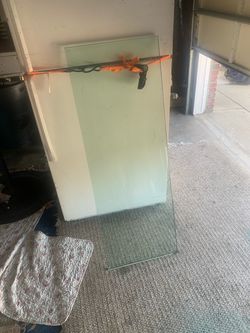 (2) 50 in by 18 in  1 inch thick glass