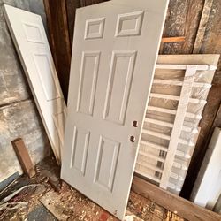 36”  left hand metal door with some jam damage