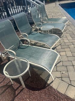 Outdoor lounge chairs and tables