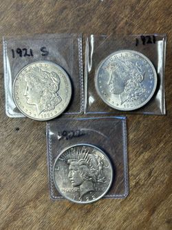 Three Silver Dollars. Group 31.