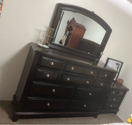 Dark brown drawer dresser and 2 nightstands
