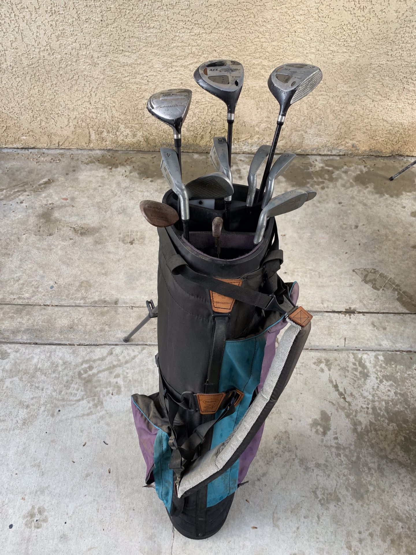 Miscellaneous golf clubs with bag