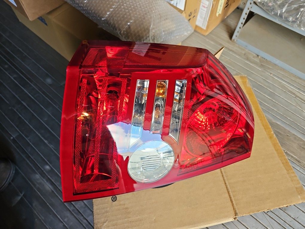 OEM New Left Tail Lamp (2008-2010 Chrysler 300)