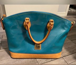 Dooney and Bourke Darcy Turquoise Teal Blue Patent leather Satchel Wristlet Approximately measures H 3.75" × W 1.25" × L 6"