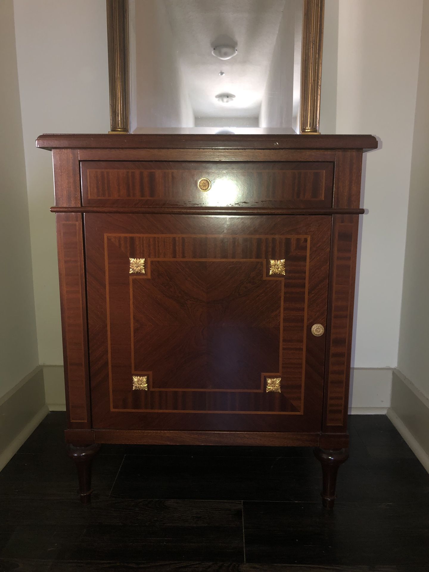 Inlaid wood side table with gold leaf accent