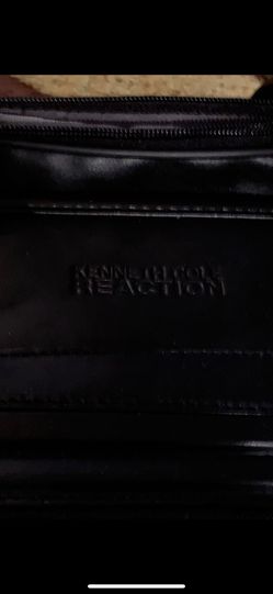 Kenneth Cole rolling suitcase