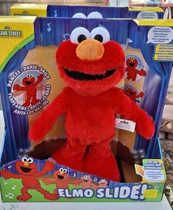 Sesame Street Elmo slide dancing plush
Muñeco de Elmo que baila
