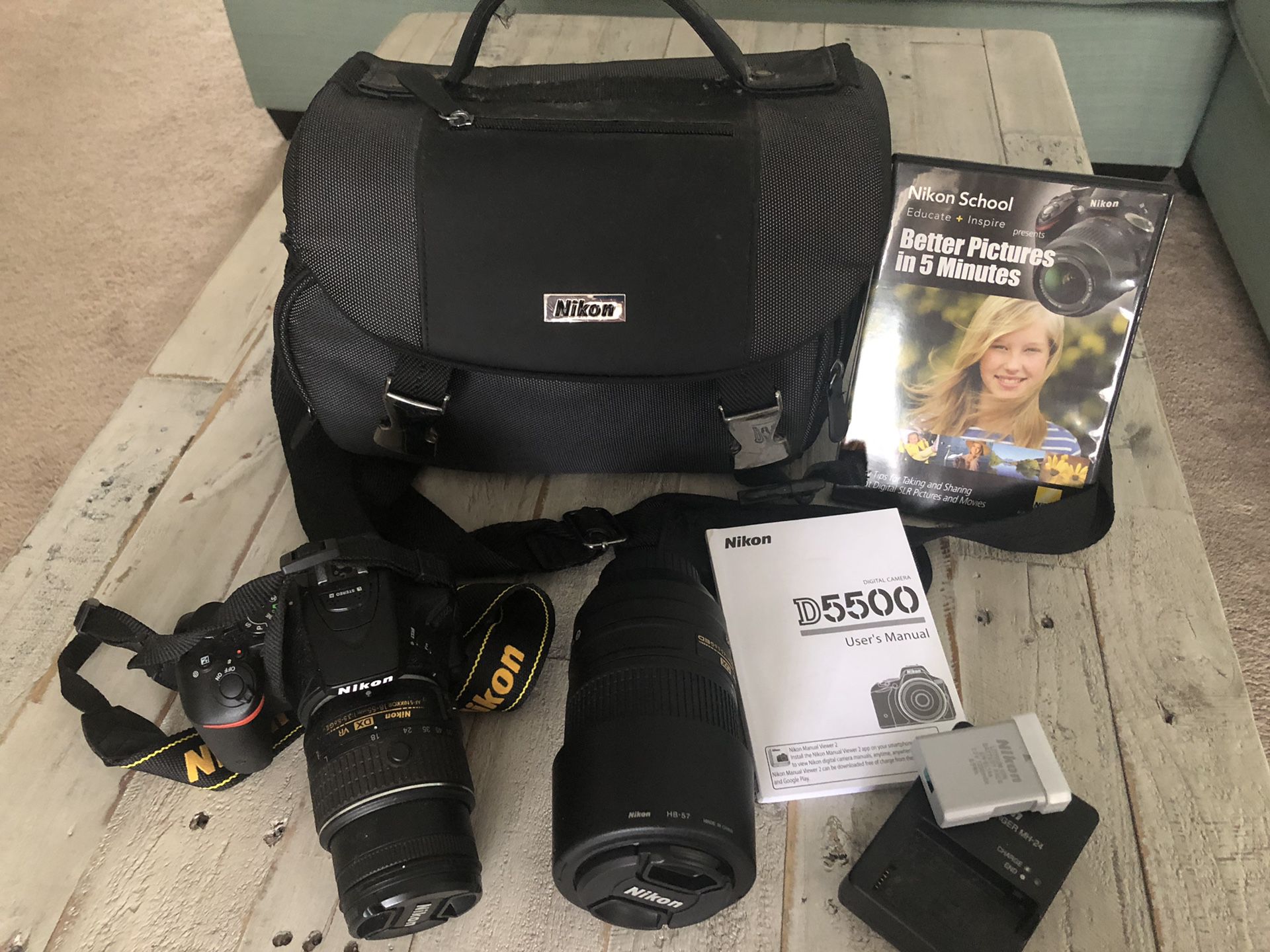 Nikon D5500 With 2 lenses, 2 batteries, battery charger, memory card, user manual and dvd, and camera bag
