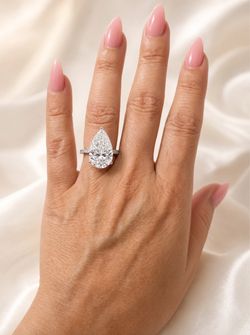 Stunning 5.52 Carat Pear Diamond Engagement Ring - Size 5 (IGI Certified)