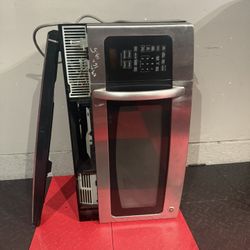 GE MICROWAVE WITH STOVE WENT FAN