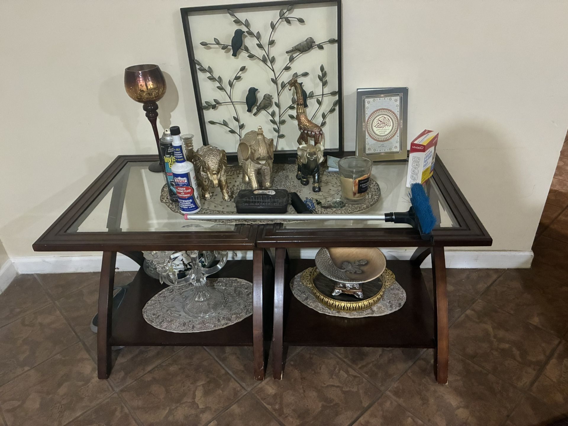 2 Glass Top Table Ends With Items On Top Included 