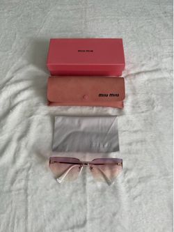 Miu Miu Pink Rimless Women’s Sunglasses