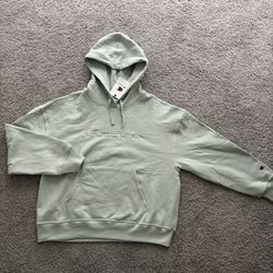 Champion light green hoodie (Women’s large)