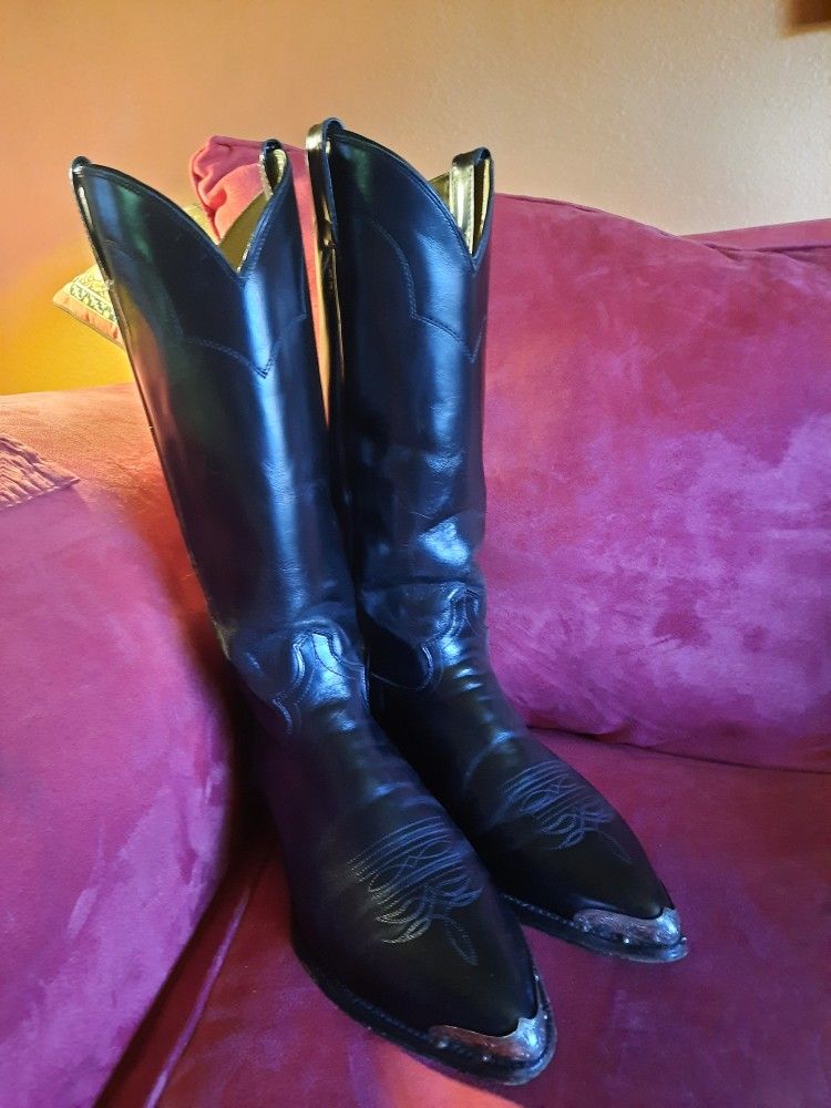 For sale black leather Justin Western boots With silver tips and silver heels size 9 D $125 Very neat and cool