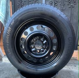1 GOOD USED RIM &TIRE FOR SPARE 16X6 1/2  5X4.5 215/60R16 OPTIMUM TIRE $25 SOLD AS IT IS PICKUP ONLY